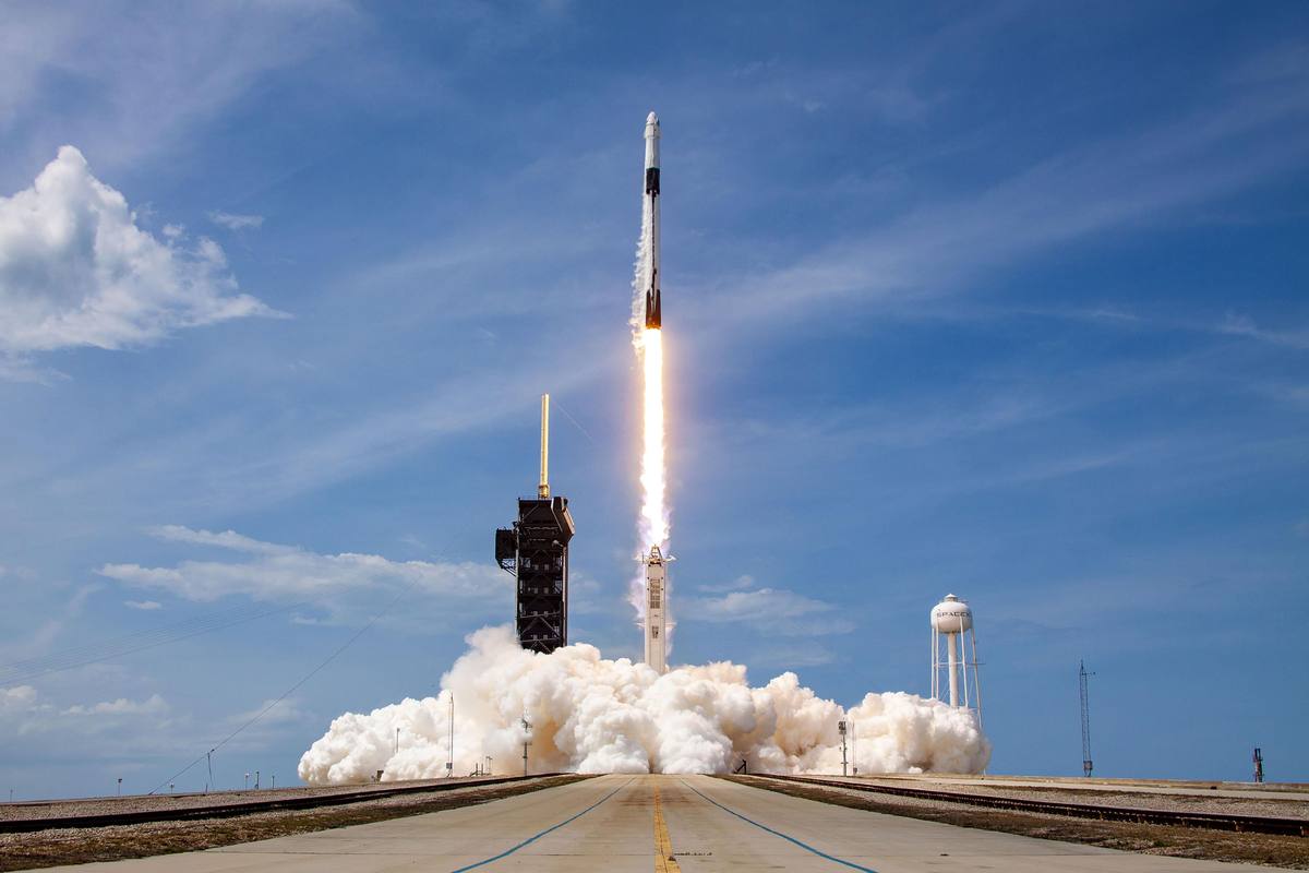 Falcon 9 lifts off carrying Crew Dragon